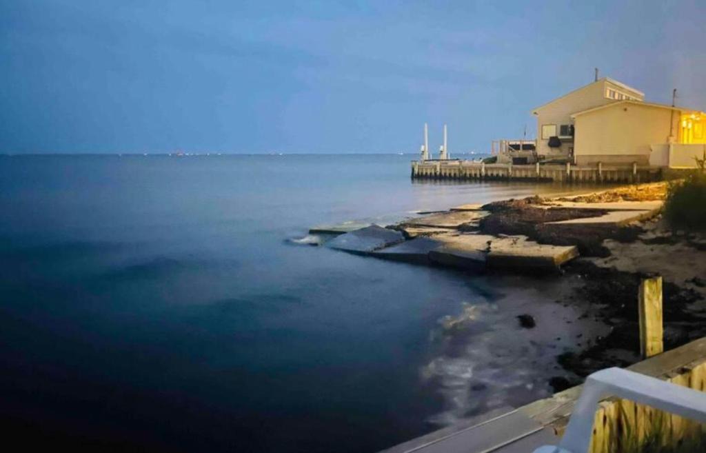 Long Island House | waterside studio plus 2 master bedroom 1full bathroom back entrance beach view canal docks Wifi code