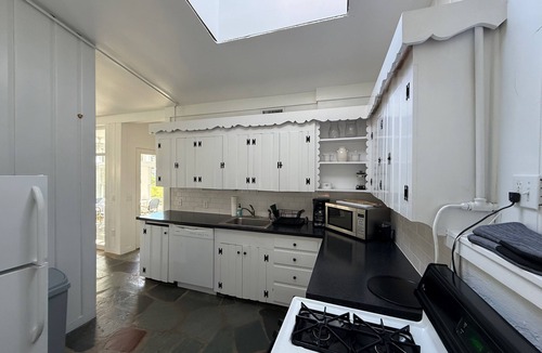 Cotuit House | Beachfront Cape Cod Cottage Overlooking Cotuit Harbor & Walk to Village