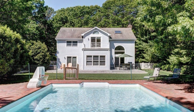 Classic Summer home with heated pool, hot tub, deck, outdoor seating,...