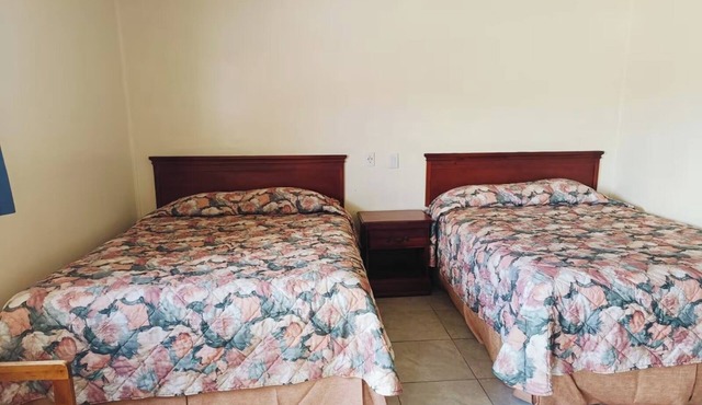 Stay & Save: 2 Queen Beds w/Wi-Fi, Parking, Near Restaurants, & Attractions